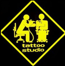 cartel estudio tatuaje